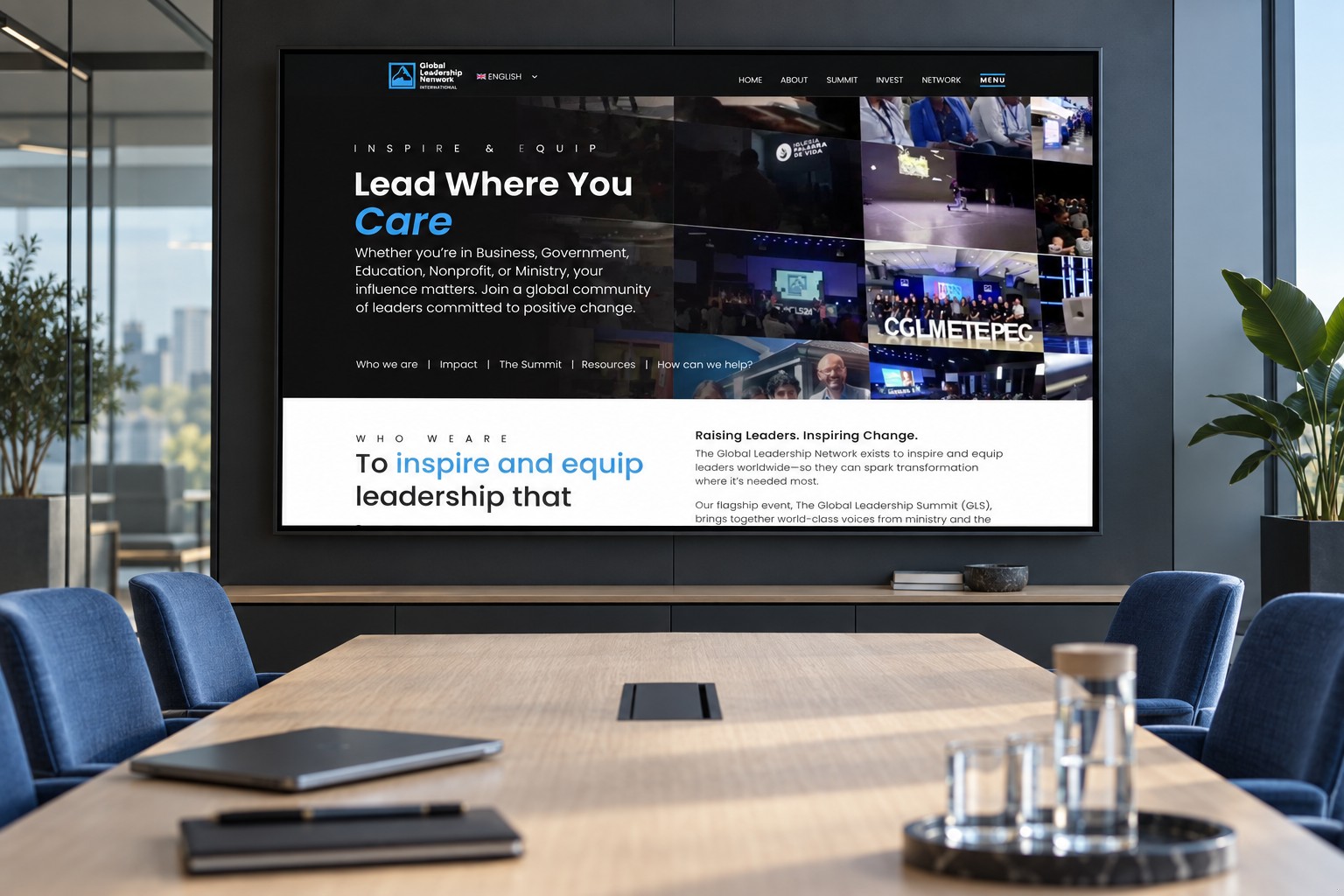 GLNI homepage displayed on a wall-mounted screen in a meeting-room concept